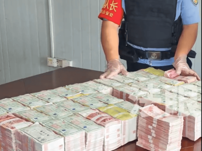 2名男子拖着大型行李箱过安检，被发现装有400万元现金，结局令人舒适